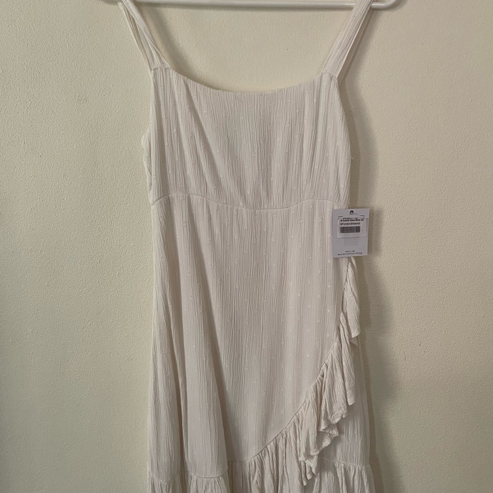 Cream Sleeveless Dress with Ruffle Detail